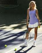 Women's pleated tennis dress with sculpted waist design
